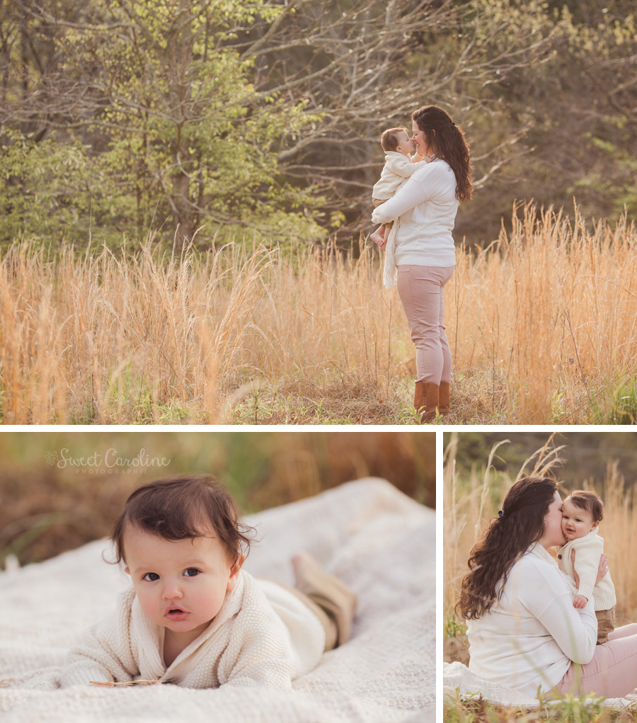 mama holding baby in tall grass