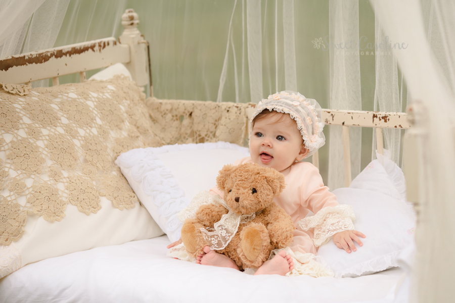 vintage six month baby girl with teddy